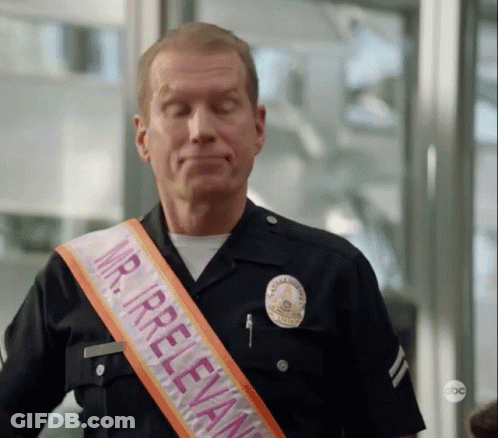 Police Officer Wearing Mr Irrelevant Sash GIF