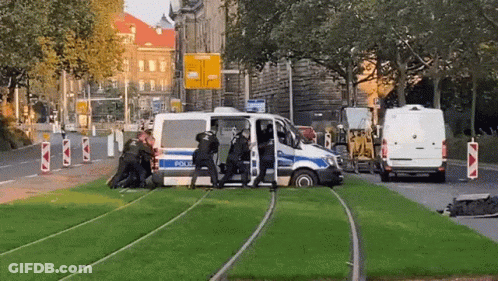Police Officers Getting Out Of Van GIF