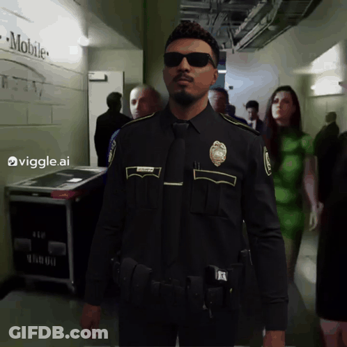Police Uniform Man Next To T-Mobile Sign GIF
