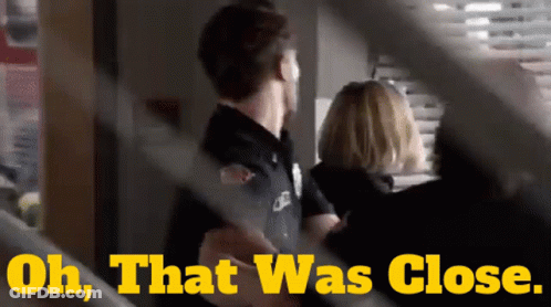 Policeman And Woman Oh That Was Close GIF