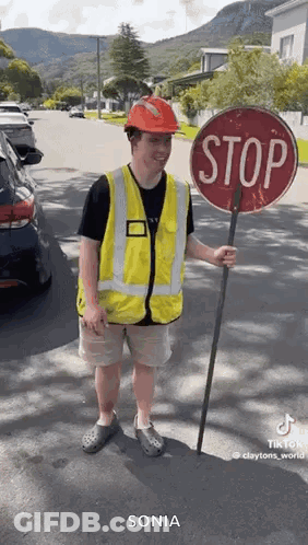 Policeman Singing Into Microphone On Stage GIF