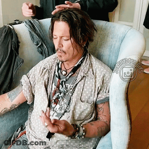 Polka Dot Shirt Man Sitting Eyes Closed Johnnydope.org GIF
