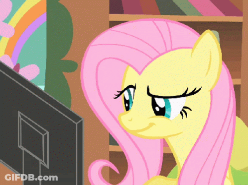 Pony Looking At Computer GIF