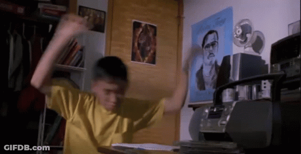 Pootie Tang Kid Wiggling Both Hands Up In Air GIF