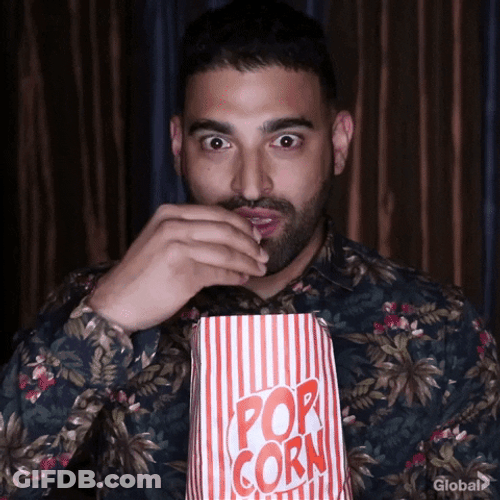 Popcorn Eating Watching Drama GIF