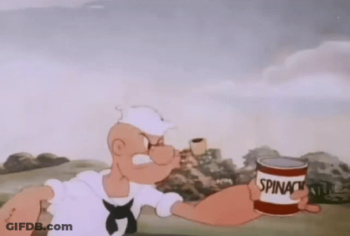 Popeye The Sailor Is Holding A Can Of Spinach And A Cup Of Coffee . GIF