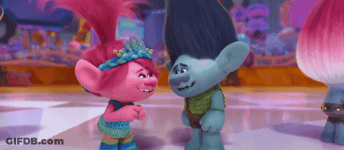 Poppy And Branch From Trolls Are Standing Next To Each Other On A Dance Floor . GIF