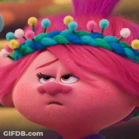 Poppy From Trolls Is Wearing A Crown Of Pom Poms On Her Head And Making A Sad Face . GIF