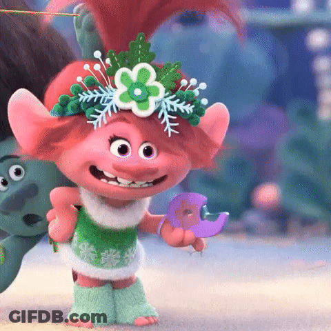 Poppy From Trolls Is Wearing A Flower Crown And Holding A Bird . GIF