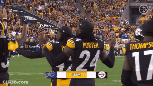 Porter #24 And Thompson #17 Hugging On Field GIF