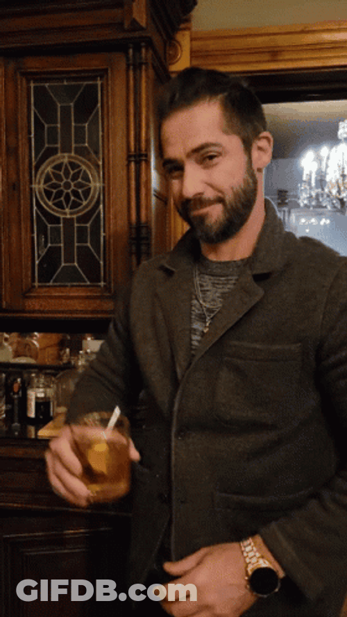 Portrait Handsome Guy Cheers For Whiskey GIF