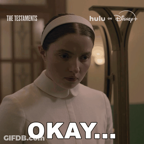 Poster For The Testaments Woman In White Headband Saying Okay GIF