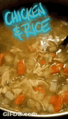 Pot Of Chicken And Rice Soup With Spoon GIF