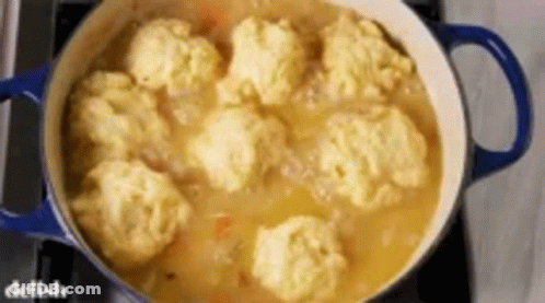 Pot Of Dumplings Cooking On Stove GIF
