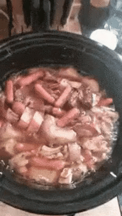 Potluck Putting Meat In The Pot GIF