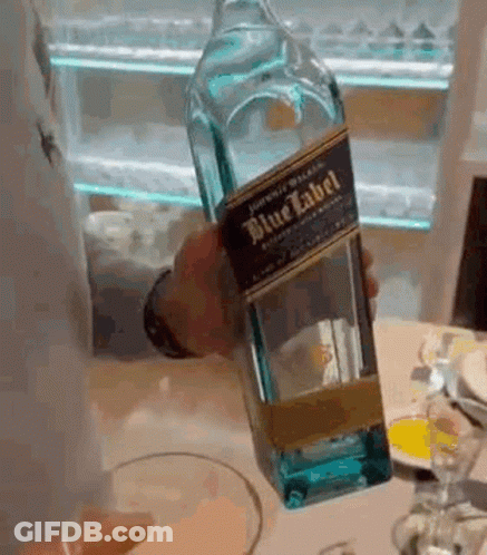 Pouring Blue Label Whiskey Into Glass GIF