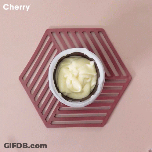 Pouring Blueberries Into Wooden Cup GIF
