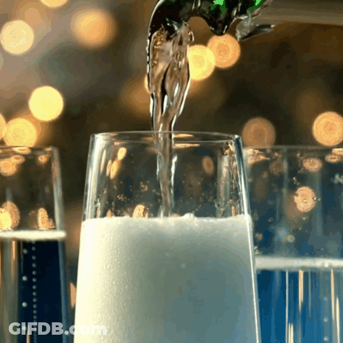 Pouring Champagne Into Glass GIF