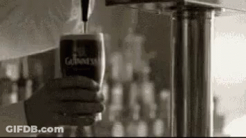 Pouring Guinness Into Glass From Tap GIF
