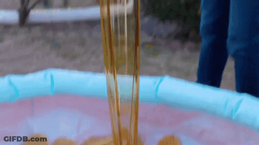 Pouring Honey Into Pool Of Waffles GIF