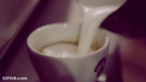 Pouring Milk Into Cup Of Cappuccino GIF