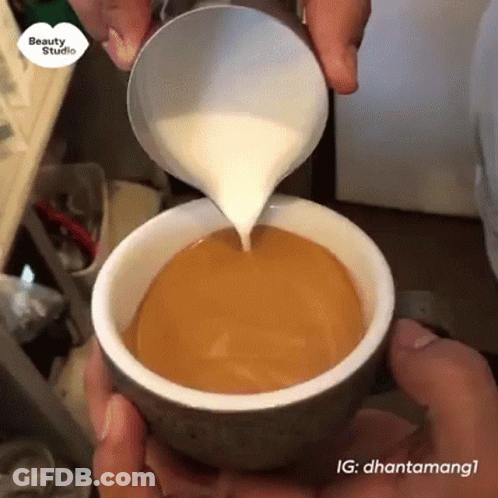 Pouring Milk Into Cup Of Coffee GIF