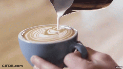 Pouring Milk Into Cup Of Coffee GIF