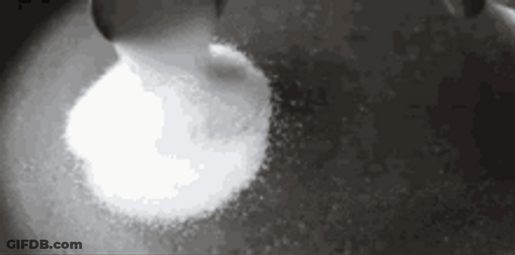 Pouring Salty Particles GIF
