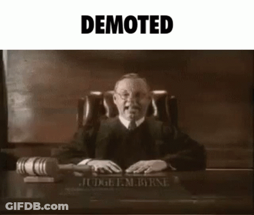 Power Ranger Holding Device Saying Looks Like You've Been Demoted GIF