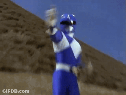Power Ranger In Blue And White Holding Item GIF