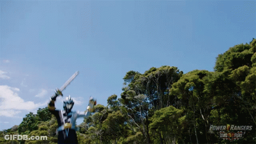 Power Rangers Man Holding Sword In Forest GIF