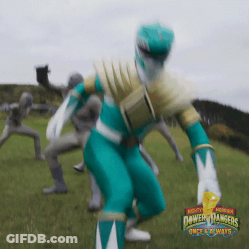 Power Rangers Standing In Grassy Field GIF