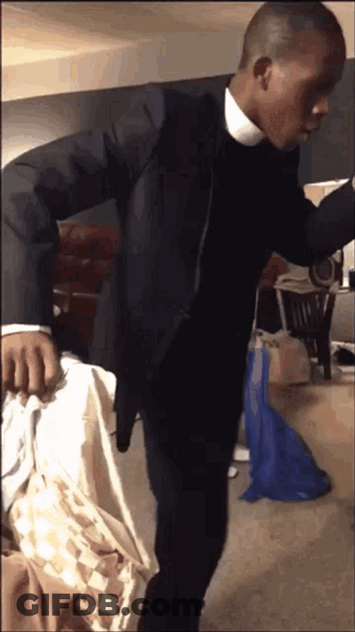 Praise Dance Black Guy Holding His Chair GIF