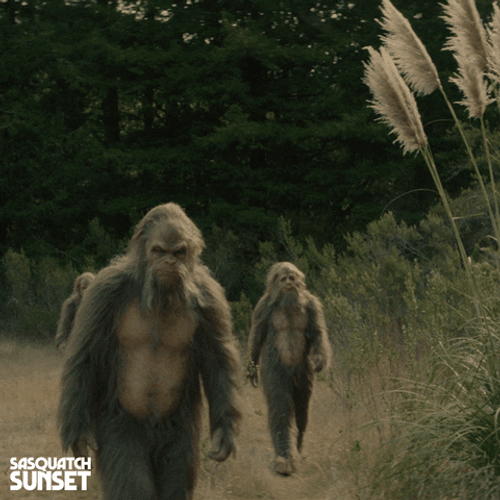 Pre Historic Men Hiking In Wild GIF