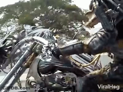 Predator Statue Riding Motorcycle GIF