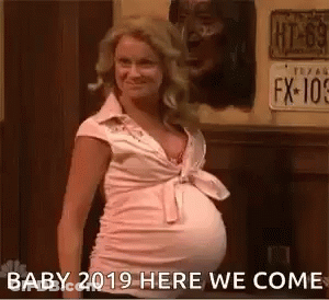 Pregnant Woman In Pink Shirt GIF