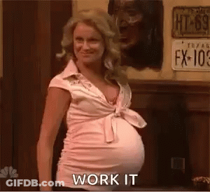 Pregnant Woman In Pink Shirt Saying Work It GIF