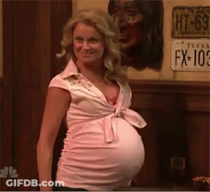 Pregnant Woman Standing By License Plate GIF
