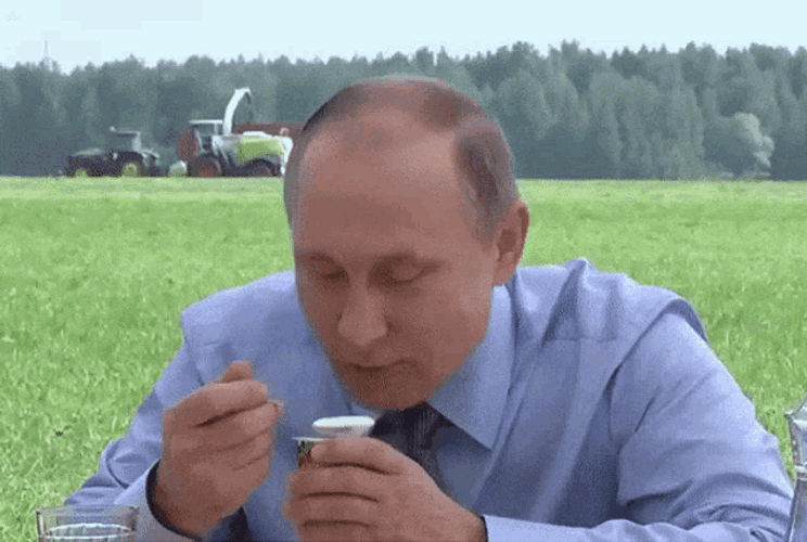 President Vladimir Putin Happily Eating Ice Cream GIF