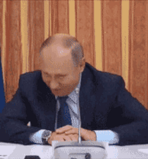 President Vladimir Putin Laughing Covering Face GIF