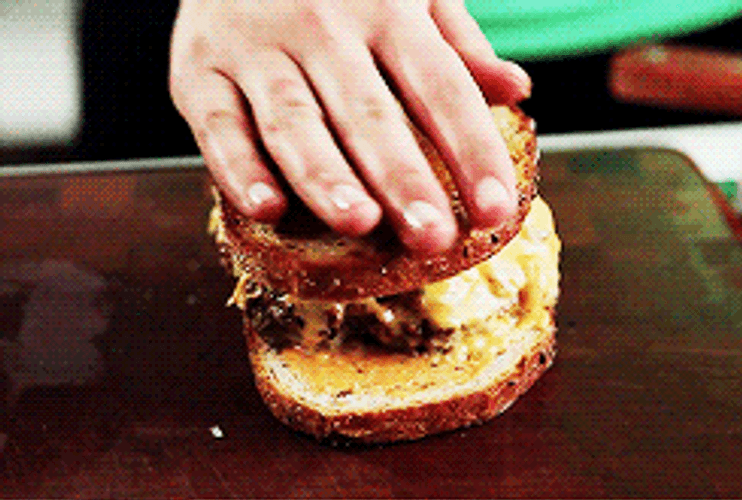 Pressing Cheesy Burger GIF