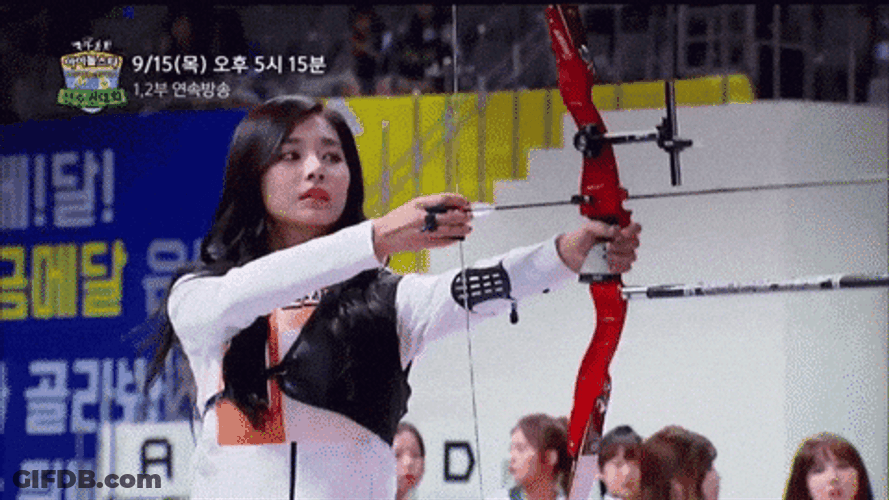 Pretty Asian Participating In Archery Competition GIF
