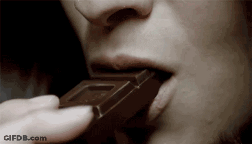 Pretty Lady Speed Chomping On Chocolate GIF