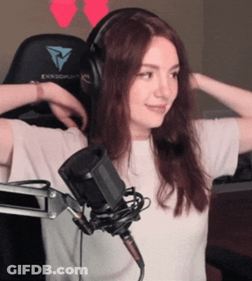 Pretty Woman Warming Up Her Back GIF