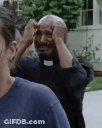 Priest Crying Beside Man GIF