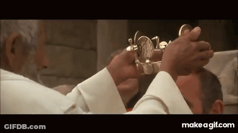 Priest Cutting Man's Head With Scissors In Church GIF