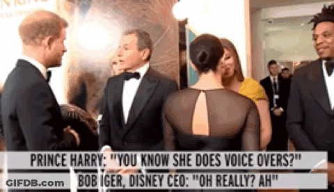 Prince Harry Is Talking To Bob Iger And Disney Ceo At An Event . GIF