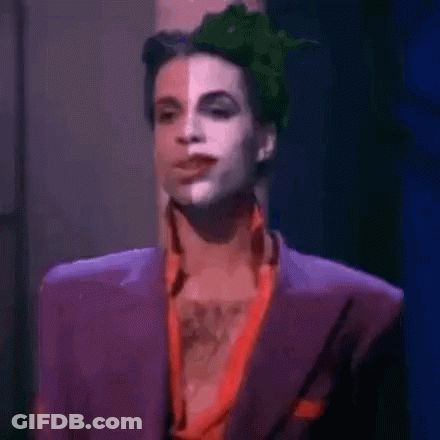 Prince In Purple Suit And Green Hat GIF