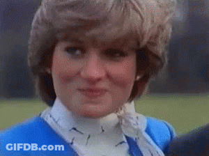 Princess Diana Is Wearing A Blue Jacket And White Collared Shirt . GIF