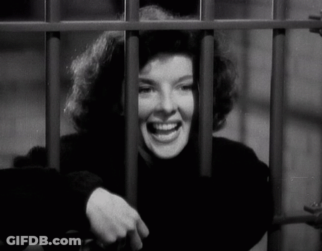 Prison Bars Happy Woman Waving Hand GIF
